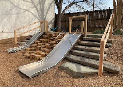 hill with slide and steps